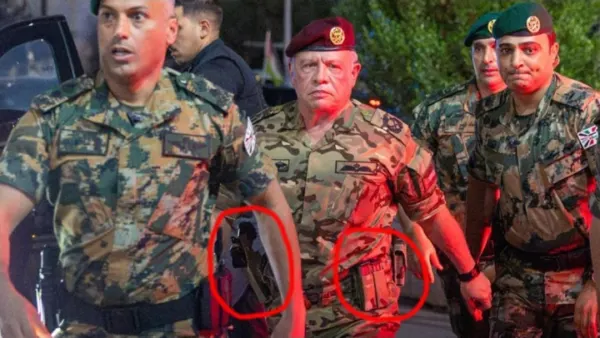 الملك عبدالله الثاني يزور مصابي الكرك بالزي العسكري
